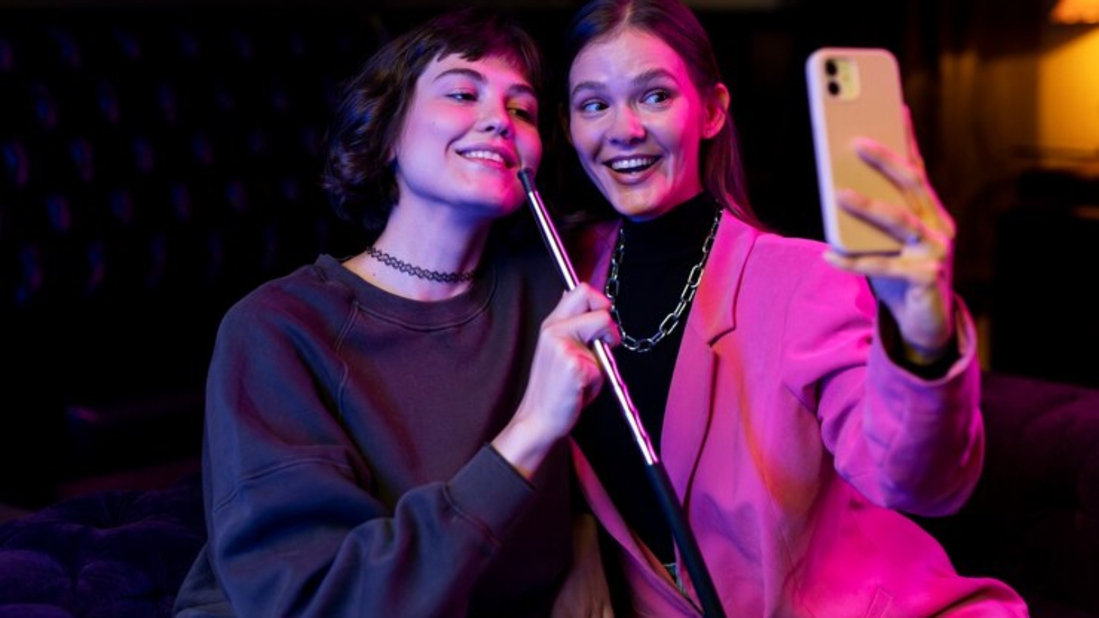 women-vaping-from-hookah-indoors_23-2149173644